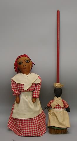 Appraisal: Pair of black cloth one-of-a-kind folk art dolls Bottle doll