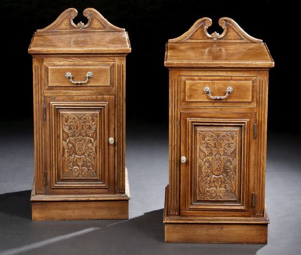 Appraisal: Pair of Victorian-Style Oak Bedside Cupboards each with a broken-arch