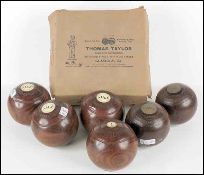 Appraisal: SET OF FOUR THOMAS TAYLOR SCOTTISH LAWN BALLS With original