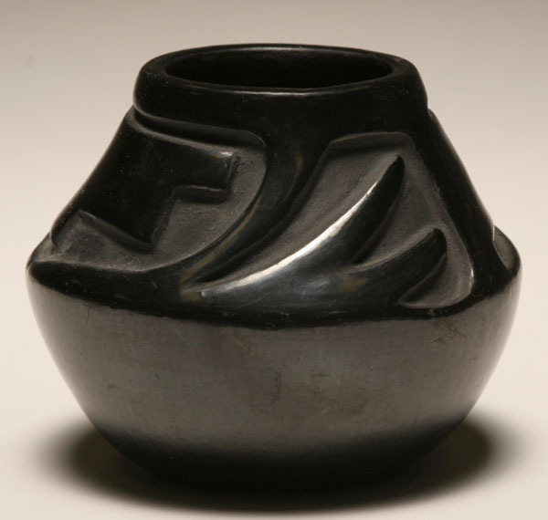 Appraisal: Juanita Wo-Peen San Ildefonso black art pottery vase with carved