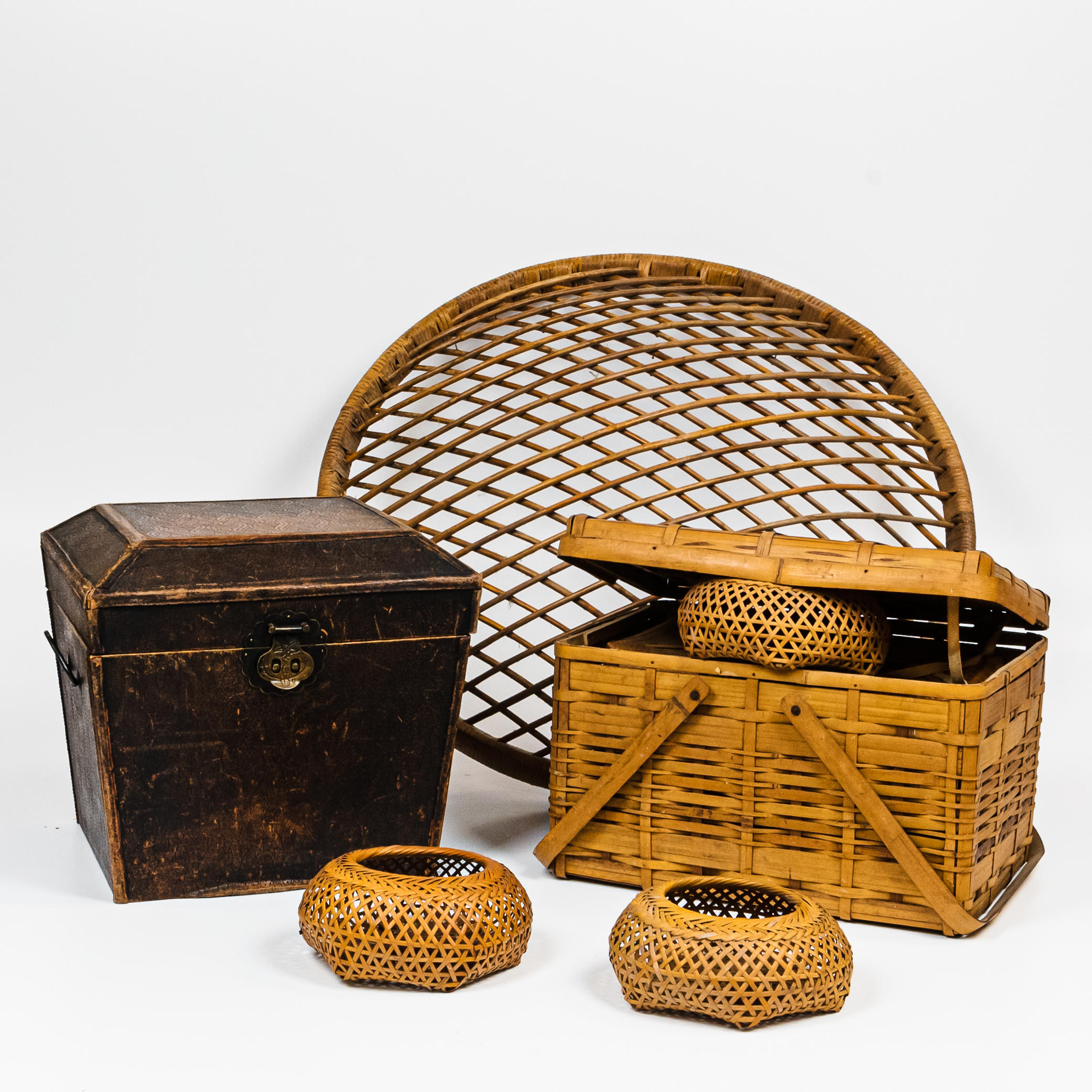 Appraisal: Group of Baskets and a Small Leather Chest a large