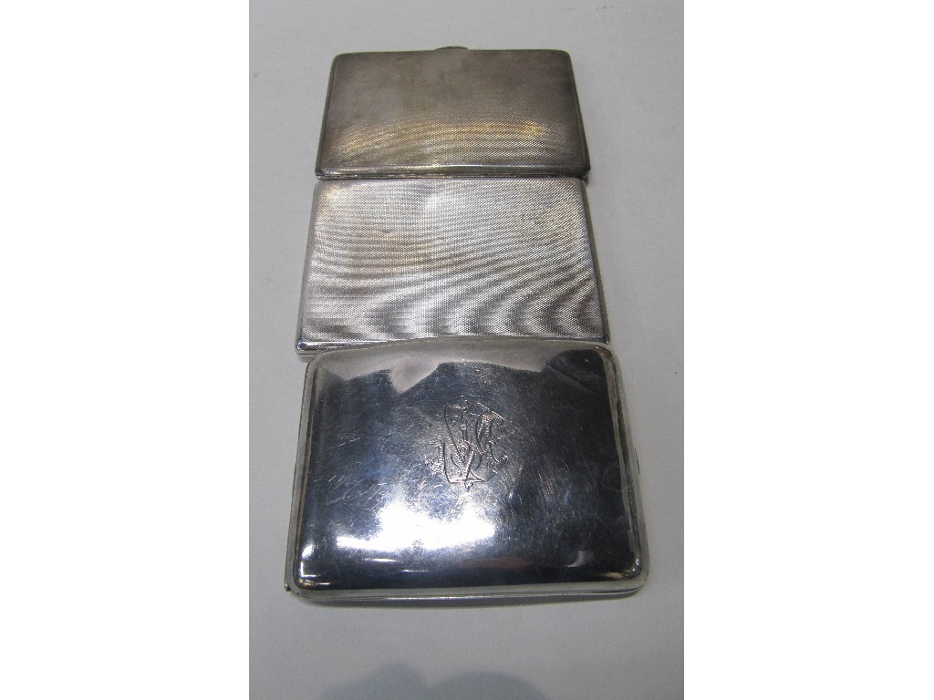 Appraisal: Lot comprising three silver cigarette cases