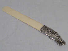 Appraisal: Russian Interest A silver and ivory page turner letter opener