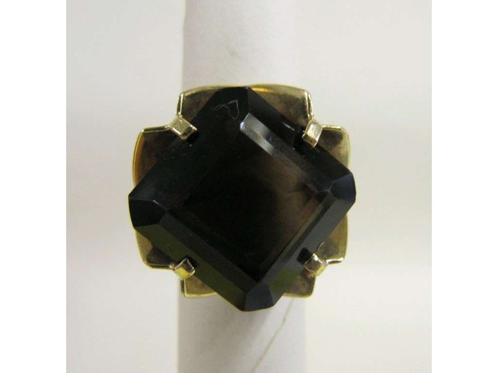 Appraisal: Nine carat gold smokey topaz single stone ring