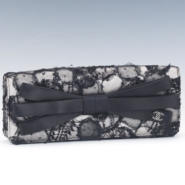 Appraisal: CHANEL BLACK LACE AND SATIN BOW CLUTCH x x The