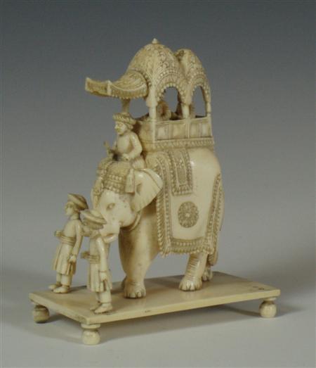 Appraisal: An early th century Indian ivory carved elephant carrying a