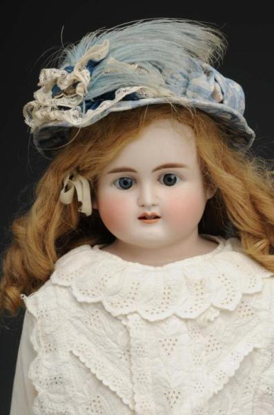 Appraisal: German Bisque Shoulder Head Doll Description Germany Ca Turned bisque