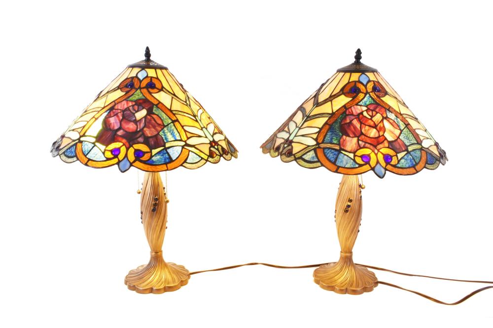 Appraisal: PAIR OF TIFFANY STYLE LEADED GLASS TABLE LAMPSEach with stylized