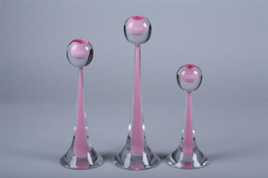 Appraisal: THREE GRADUATED MURANO PINK CASED GLASS CANDLESTICKS Cenedese Murano -