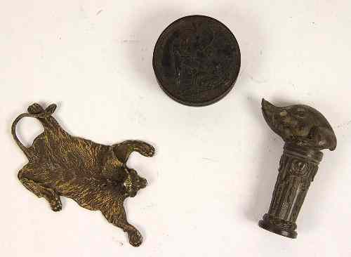 Appraisal: An Austrian bronze paperweight modelled as a lion skin cm