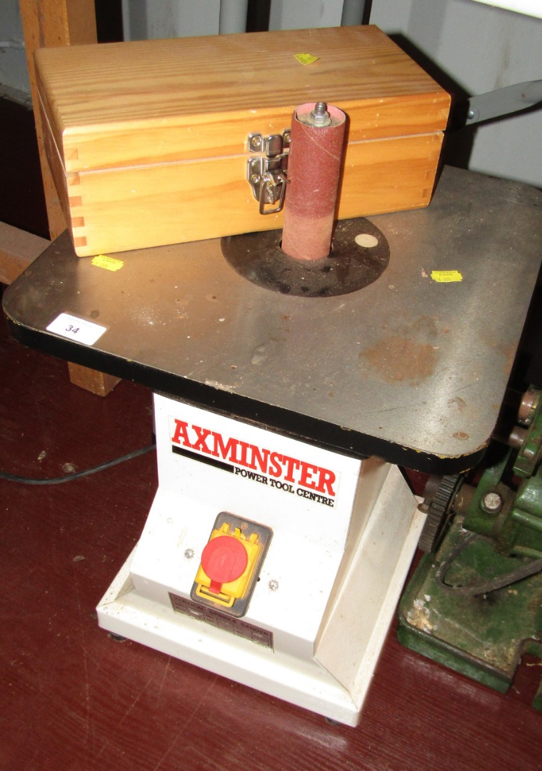 Appraisal: An Axminster Vertical spindle sander and cased attachments