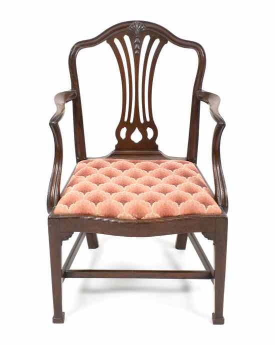 Appraisal: A George III Mahogany Armchair having a shaped shield back