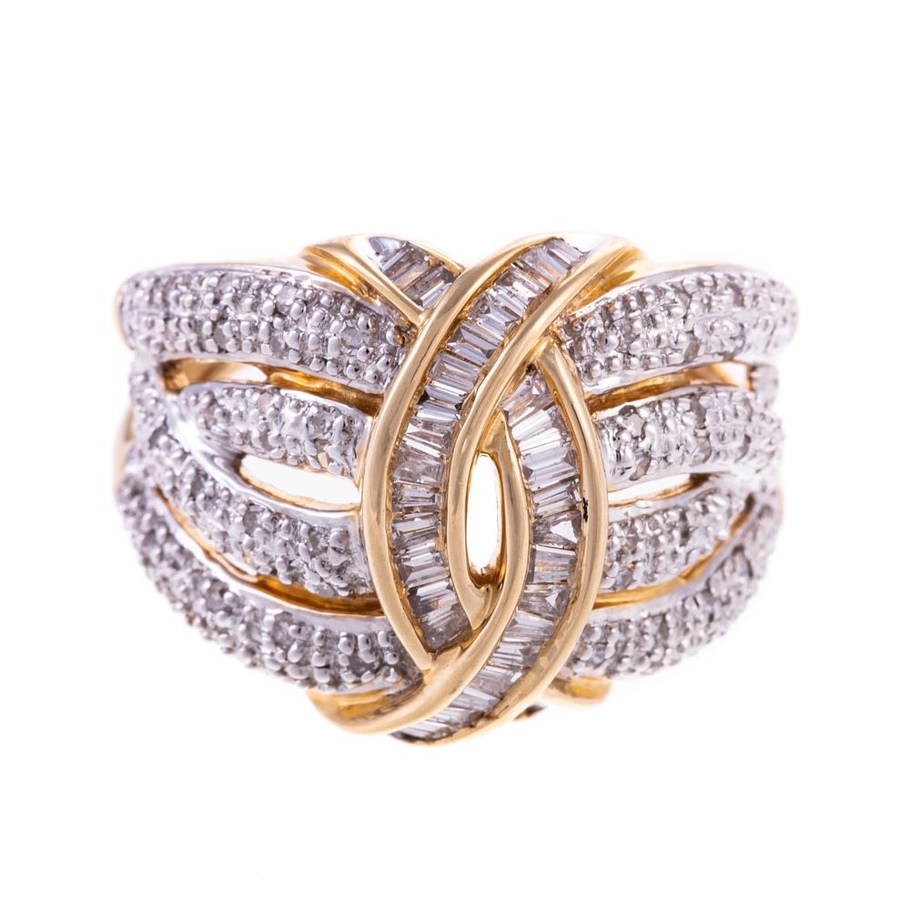 Appraisal: A Diamond Interlocking Ribbon Ring in K K yellow gold