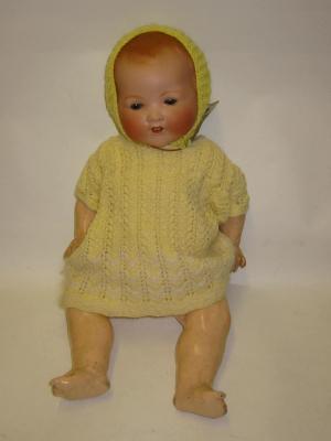 Appraisal: An Armand Marseille bisque head baby doll with blue glass