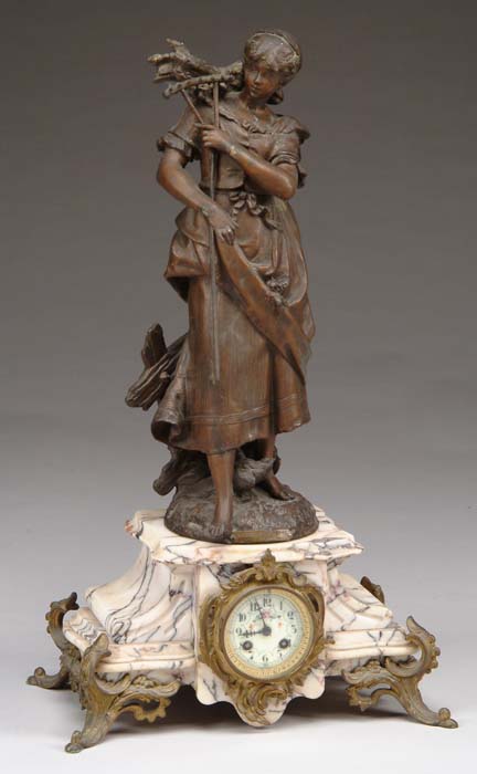 Appraisal: FIGURAL MARBLE AND SPELTER MANTLE CLOCK Spelter figure of a