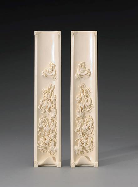 Appraisal: A pair of ivory wrist rests th Century Each carved