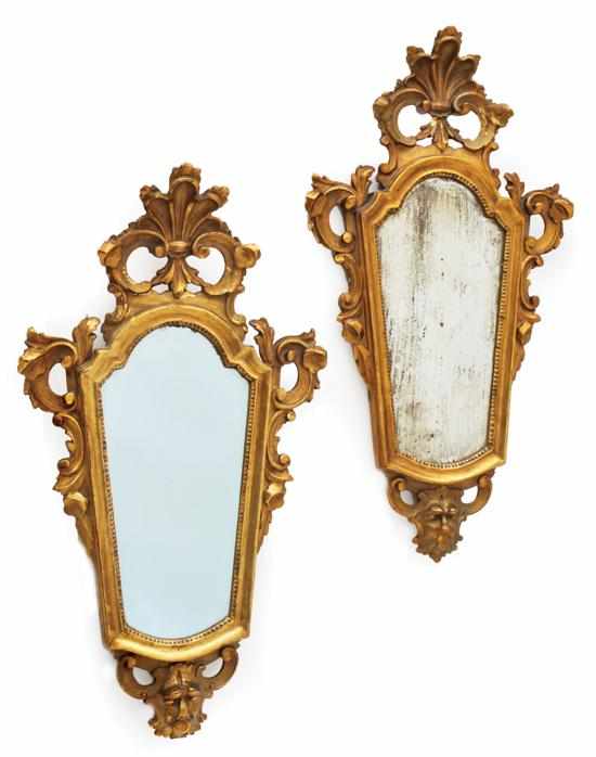 Appraisal: A pair of Italian gilt wood mirrors th century Each