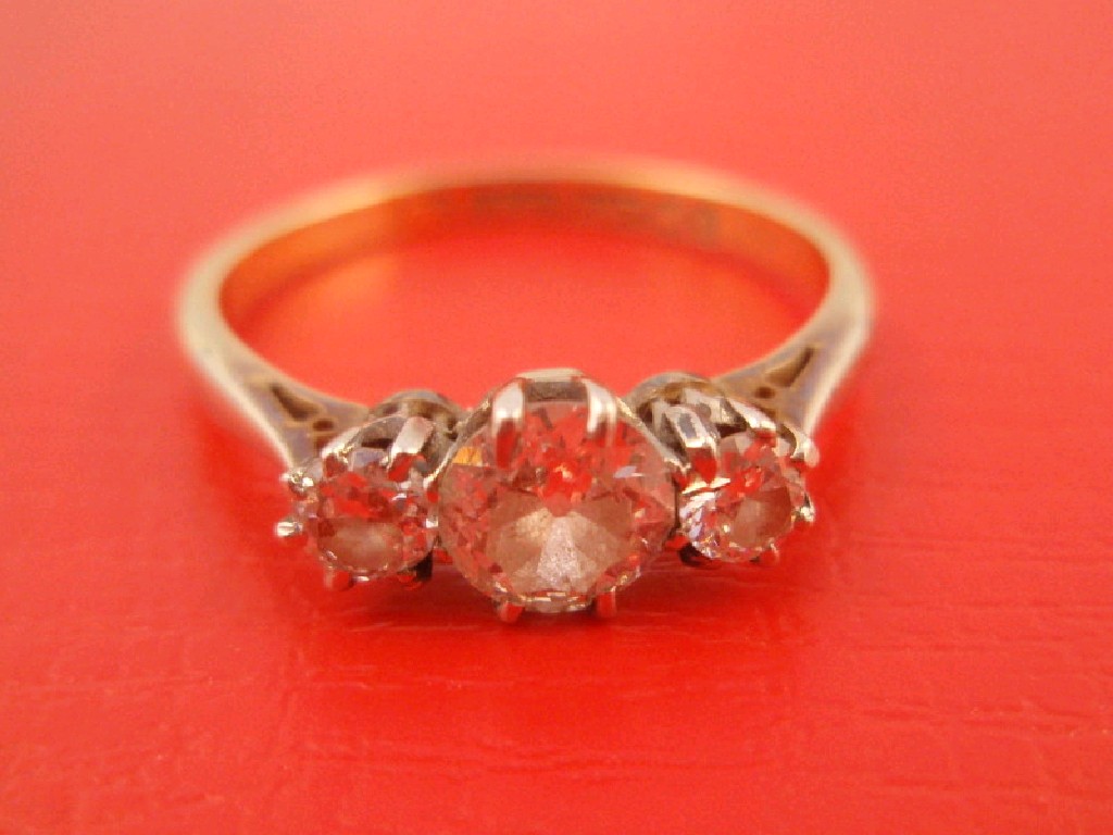 Appraisal: A three stone diamond ring total estimated weight of diamonds