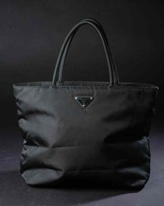 Appraisal: PRADA BLACK NYLON HANDBAG Divided compartment interior with side zipper