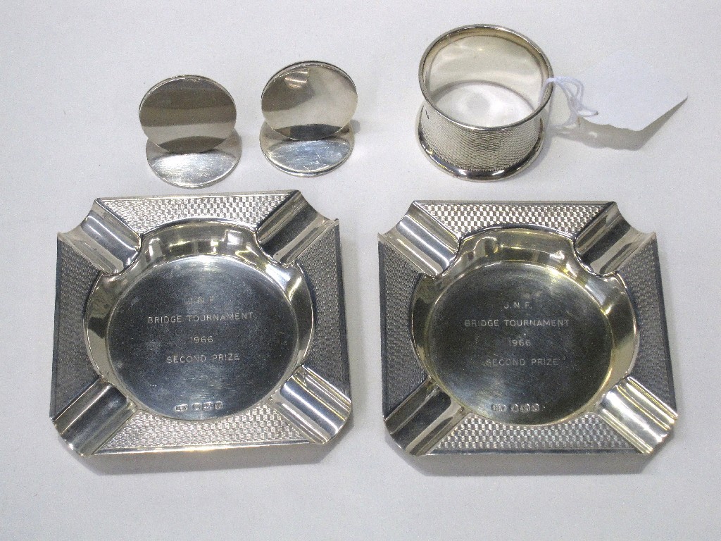 Appraisal: Lot comprising pair silver ashtrays placecard holder and a silver