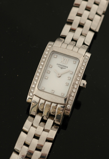 Appraisal: A Ladies Longines diamond wristwatch Quartz rectangular mother of pearl