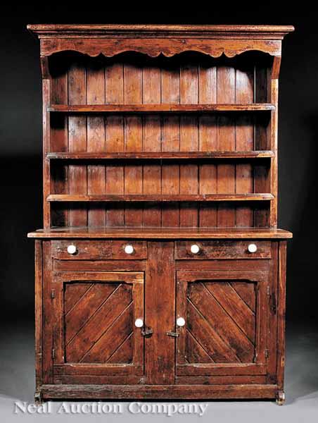 Appraisal: An Antique Irish George III-Style Pine Dresser molded cornice scalloped