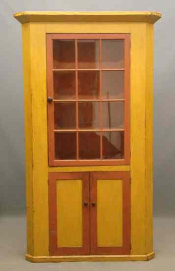 Appraisal: th c door corner cupboard in later red and yellow