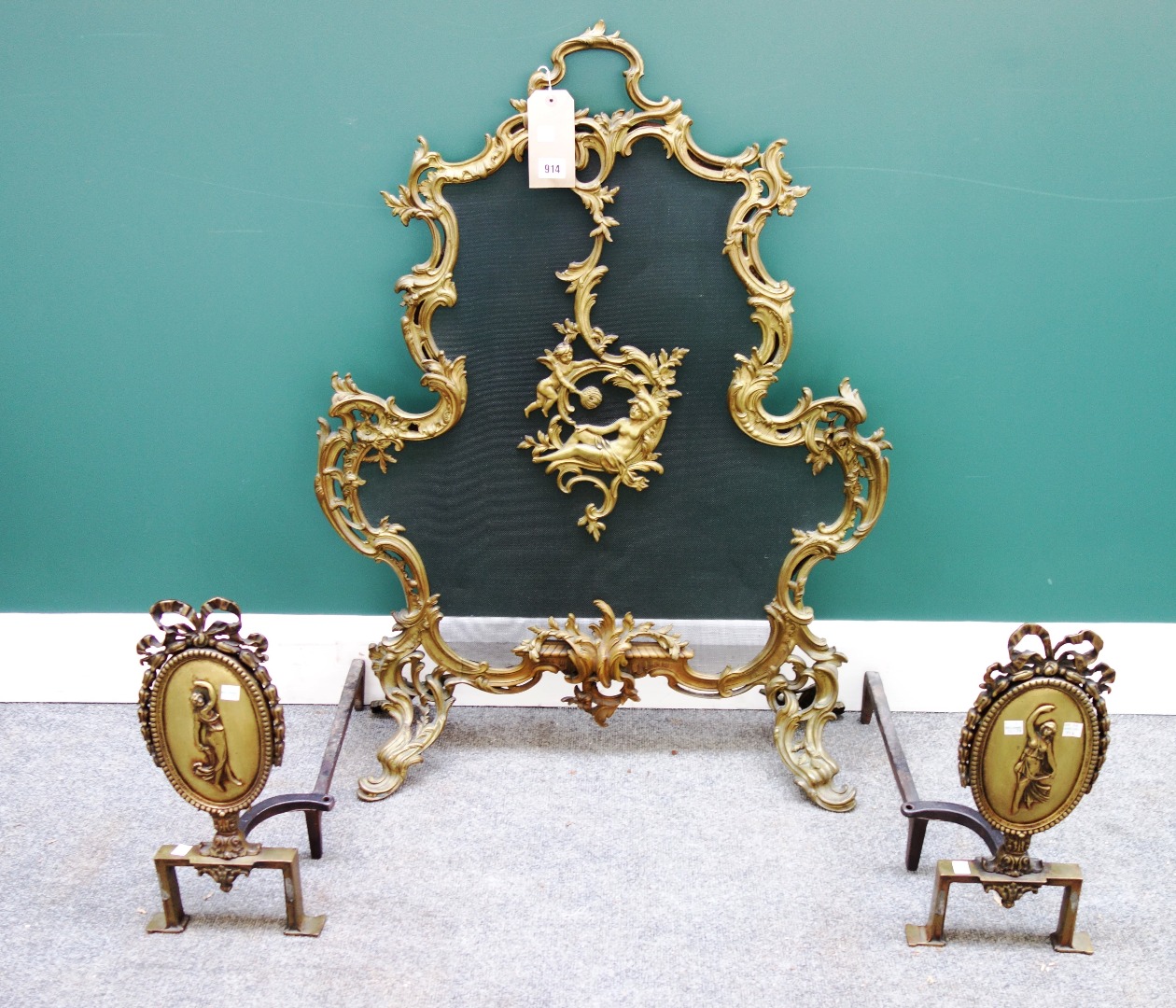 Appraisal: A Louis XV style Rococo inspired brass and steel mesh