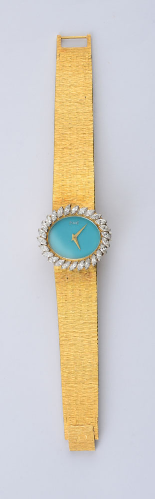 Appraisal: LADY'S K GOLD TURQUOISE AND DIAMOND WRISTWATCH PIAGET Turquoise dial