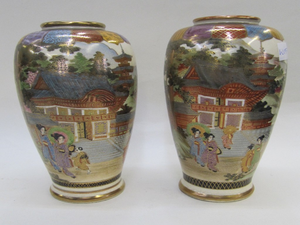 Appraisal: Pair of Japanese Satsuma vases decorated with geishas in front