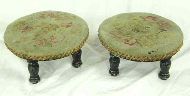 Appraisal: A pair of small needlework footstools each on three turned