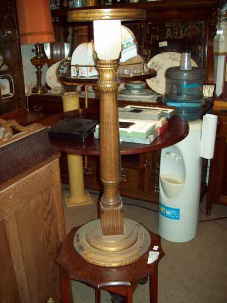 Appraisal: AN EDWARDIAN CEDAR OCCASIONAL TABLE AND AN OAK POT PLANT