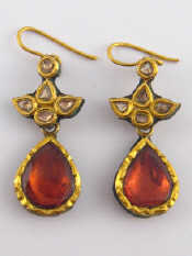 Appraisal: A pair of gold cased enamelled gem set Indian earrings