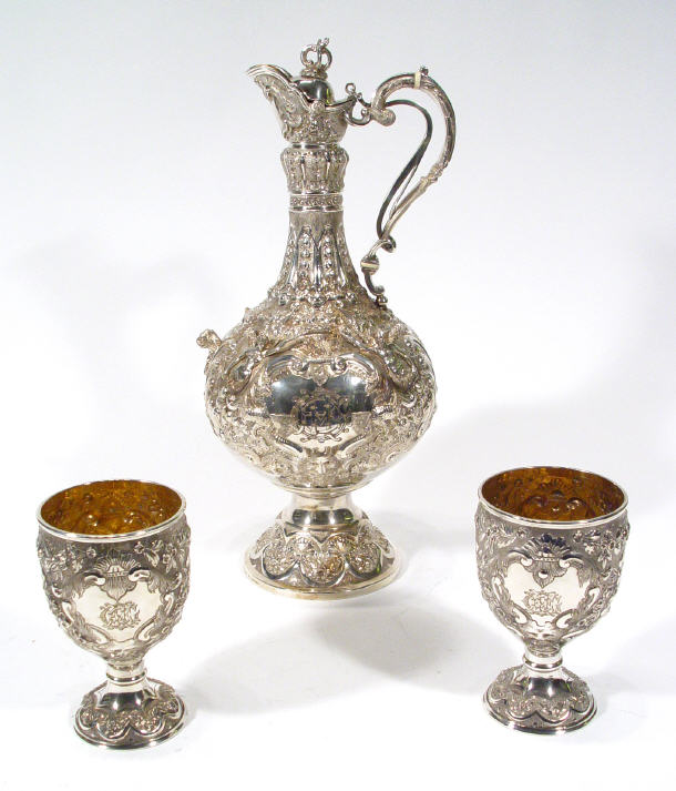 Appraisal: Victorian silver ewer and a pair of goblets with Armada