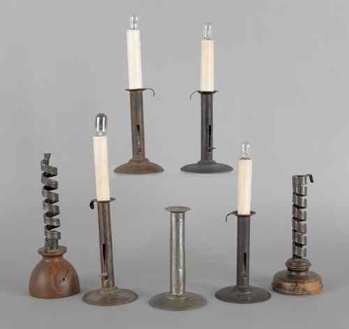 Appraisal: Five hogscraper candlesticks together with two twist ejector candlesticks several