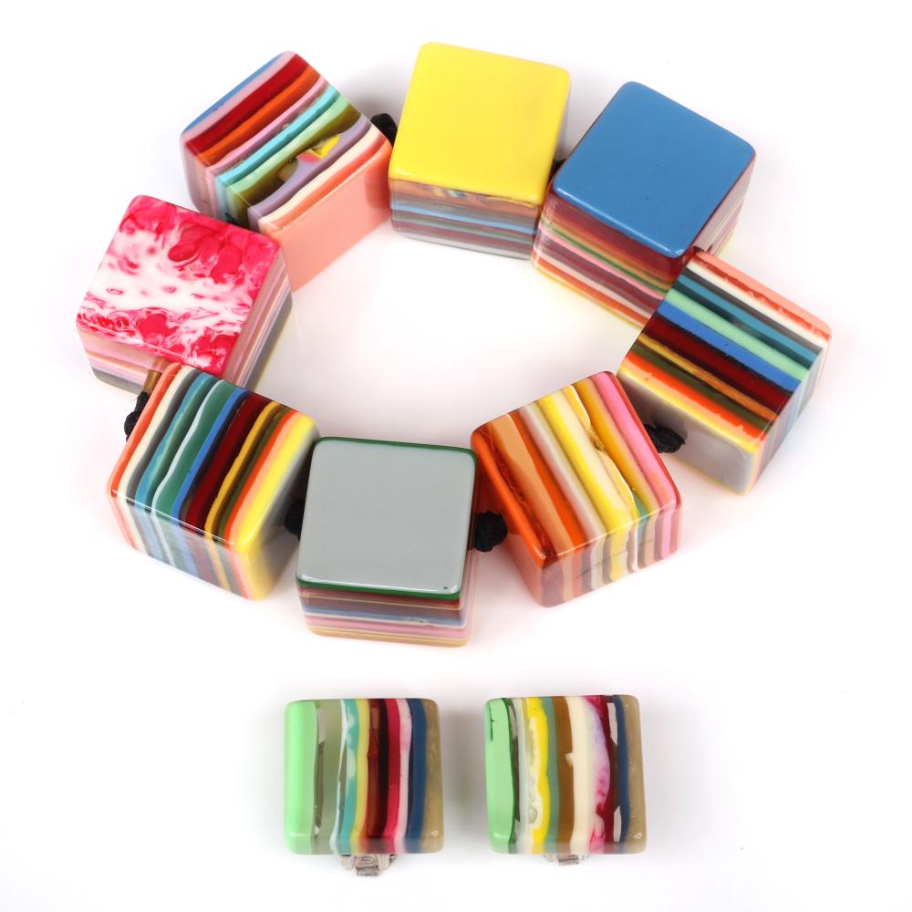 Appraisal: CARLOS SOBRAL JACKIE BRAZIL DESIGNER LAMINATED RESIN CHUNKY CUBE BEAD