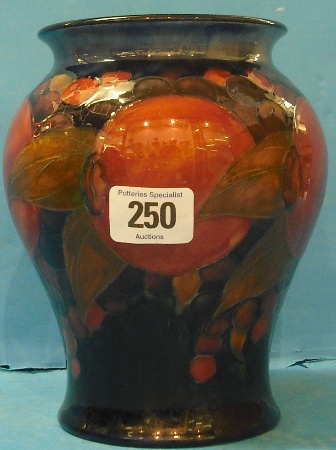 Appraisal: Moorcroft Burslem Vase decorated in the Pomegranite design height cm