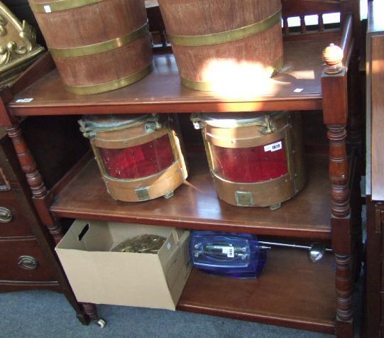 Appraisal: A th century mahogany three tier buffet with three quarter