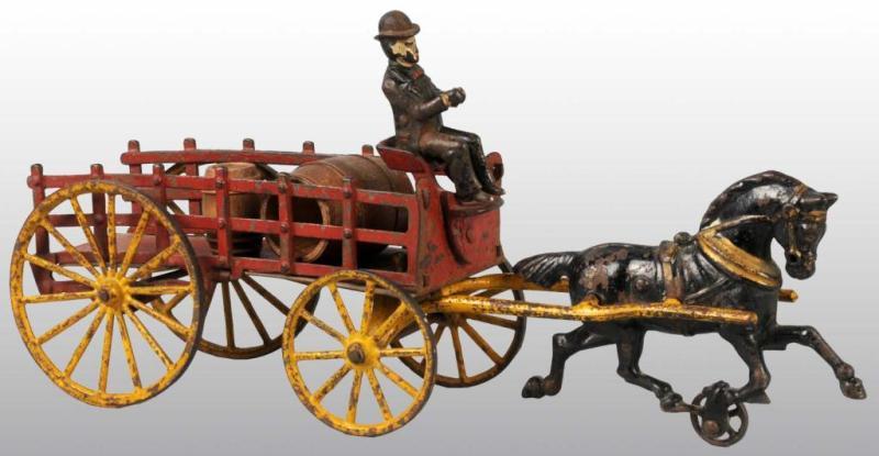 Appraisal: Cast Iron Hubley Horse-Drawn Dray Wagon Toy Description Pulled by