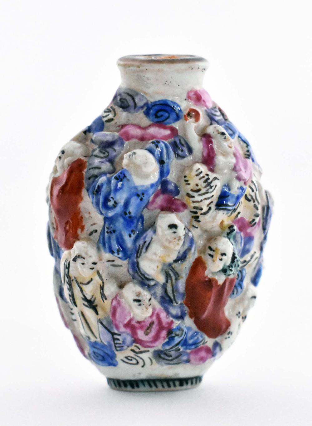 Appraisal: CHINESE POLYCHROME PORCELAIN SNUFF BOTTLECirca Molded and painted with numerous