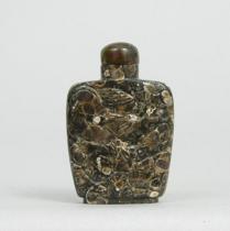 Appraisal: Carved Fossilized Stone Snuff Bottle circa th Century This snuff