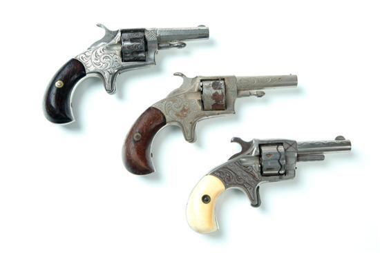 Appraisal: THREE ENGRAVED CALIBER REVOLVERS American late th century Hopkins Allen