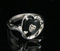 Appraisal: A Sweetheart Ring With Onyx And An Accent Diamond A