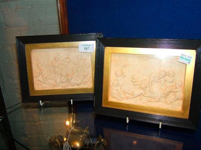 Appraisal: A pair of th Century plaster relief panels depicting Bacchanalian