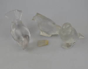 Appraisal: Three Lalique glass paperweights in the form of songbirds etched