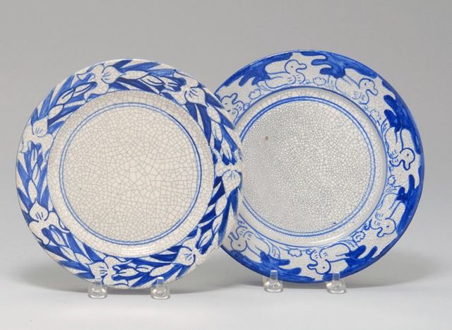 Appraisal: TWO DEDHAM POTTERY PLATES One in Iris pattern and one