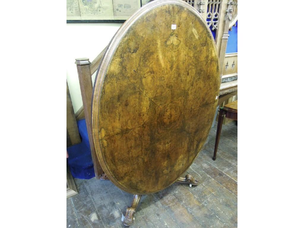 Appraisal: A Victorian walnut and figured walnut veneered tilt top breakfast