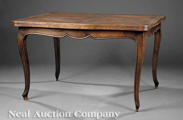 Appraisal: A Louis XV-Style Carved Elm Extension Dining Table early th