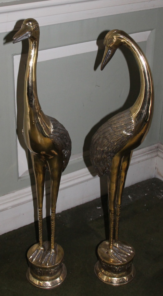 Appraisal: A pair of modern Chinese brass cranes each on a