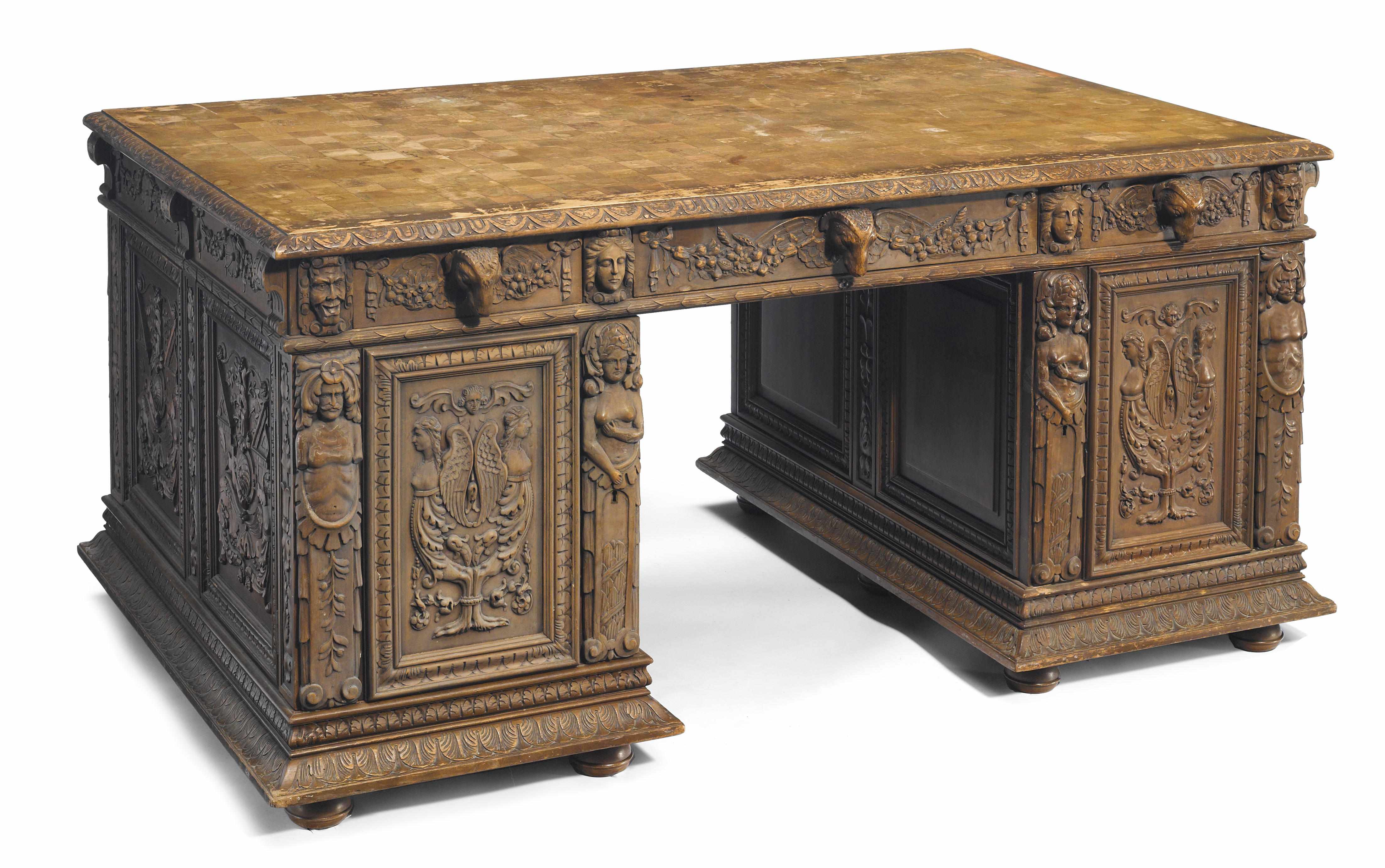 Appraisal: A Continental Renaissance Revival carved walnut partners desk possibly Belgiantogether